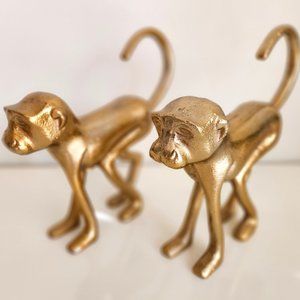 Lot of two gold color iron monkeys